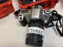 Lot 3 Cameras and Pelican Cases as Pictured