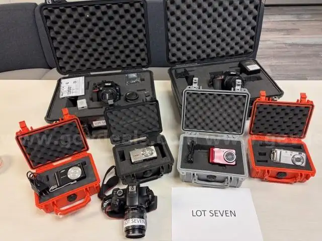 Lot 7 Cameras and Pelican Cases as Pictured