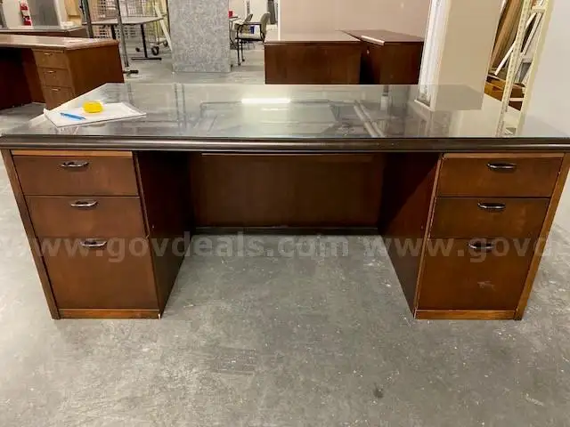 Wooden Desk with drawers and a glass top