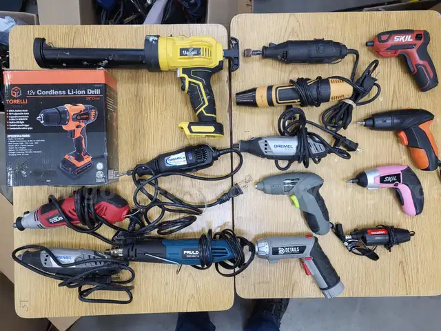 Assortment of cordless and corded power tools