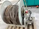 (1) Reel-Craft reel cart assembly with hose and motor, plus a pressure wand.