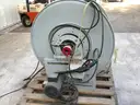 (1) Reel-Craft reel cart assembly with hose and motor, plus a pressure wand.