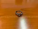 (1) Diamond solitaire ring with (26) smaller sister diamonds stones