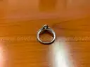 (1) Diamond solitaire ring with (26) smaller sister diamonds stones