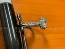 (1) Diamond solitaire ring with (26) smaller sister diamonds stones