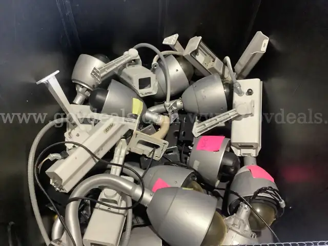 (1) Lot of Used security cameras and ceiling speakers for parts and service.