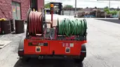 Trailer mounted sewer cleaner