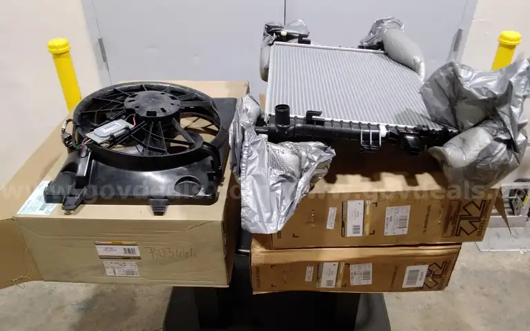 Lot of (3) Ford Motorcraft Radiator fan assemblies and radiators. New and unused
