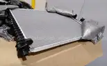 Lot of (3) Ford Motorcraft Radiator fan assemblies and radiators. New and unused