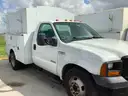 13-2521/ 2006 Ford F-350 SD, with a utility body.