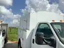 13-2521/ 2006 Ford F-350 SD, with a utility body.