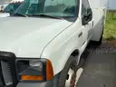 13-2521/ 2006 Ford F-350 SD, with a utility body.