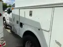 13-2521/ 2006 Ford F-350 SD, with a utility body.