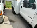 13-2521/ 2006 Ford F-350 SD, with a utility body.