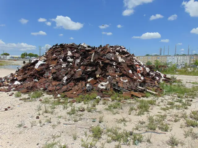 Lot of Scrap metal rail plates and rubber boots. DTPW 25-01