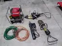 Lot of HURST firefighting equipment.