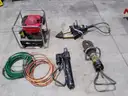 Lot of HURST firefighting equipment.