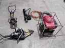 Lot of HURST firefighting equipment.
