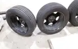 Lot of (4) Firestone Fire-Hawk Pursuit tires (275/55R20 113V M&#x26;S) mounted on Chevrolet 6 bolt stock black rims.