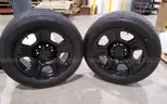 Lot of (4) Firestone Fire-Hawk Pursuit tires (275/55R20 113V M&#x26;S) mounted on Chevrolet 6 bolt stock black rims.