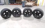 Lot of (4) Firestone Fire-Hawk Pursuit tires (275/55R20 113V M&#x26;S) mounted on Chevrolet 6 bolt stock black rims.