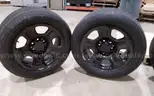 Lot of (4) Firestone Fire-Hawk Pursuit tires (275/55R20 113V M&#x26;S) mounted on Chevrolet 6 bolt stock black rims.
