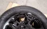 Lot of (4) Firestone Fire-Hawk Pursuit tires (275/55R20 113V M&#x26;S) mounted on Chevrolet 6 bolt stock black rims.