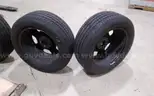 Lot of (4) Firestone Fire-Hawk Pursuit tires (275/55R20 113V M&#x26;S) mounted on Chevrolet 6 bolt stock black rims.