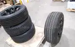 Lot of (4) Firestone Fire-Hawk Pursuit tires (275/55R20 113V M&#x26;S) mounted on Chevrolet 6 bolt stock black rims.