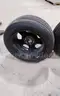 Lot of (4) Firestone Fire-Hawk Pursuit tires (275/55R20 113V M&#x26;S) mounted on Chevrolet 6 bolt stock black rims.