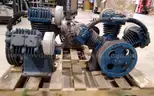 Lot of (3) Air compressor heads. For parts or repair.