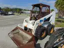 20-0251/ Bobcat 853 Skid Street loader. MIA 26-05 Orange #1