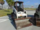 20-0251/ Bobcat 853 Skid Street loader. MIA 26-05 Orange #1