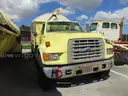 100081/ 1995 Ford F800, flatbed truck with plastic water tank. Aviation #6