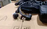 Lot of Harris microphones and radio speakers.