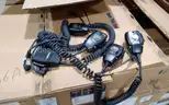 Lot of Harris microphones and radio speakers.