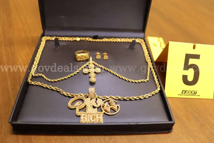 Two Gold Necklaces, 2 Pendants w/clear stones/ 2 earrings with clear stones/gold ring