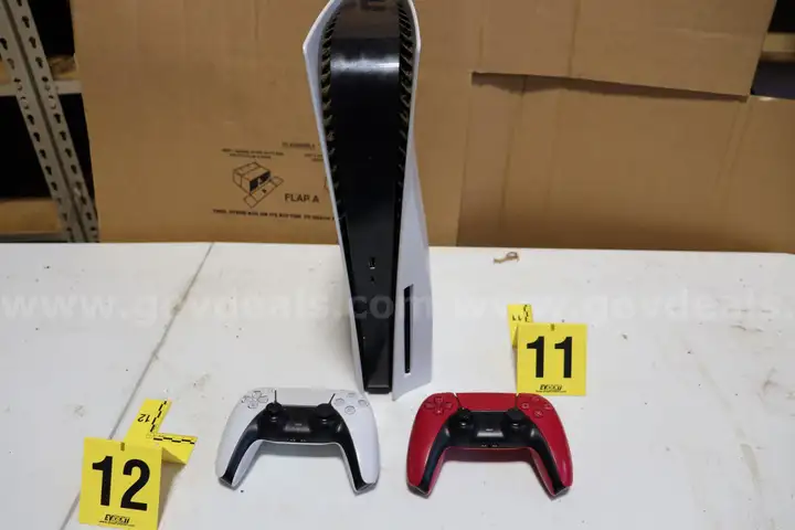 PlayStation 5 with 2 PlayStation controllers