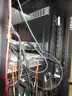 Server rack with doors elevator to remove from a basement