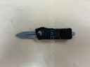 two Microtech OTF knives