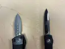 two Microtech OTF knives