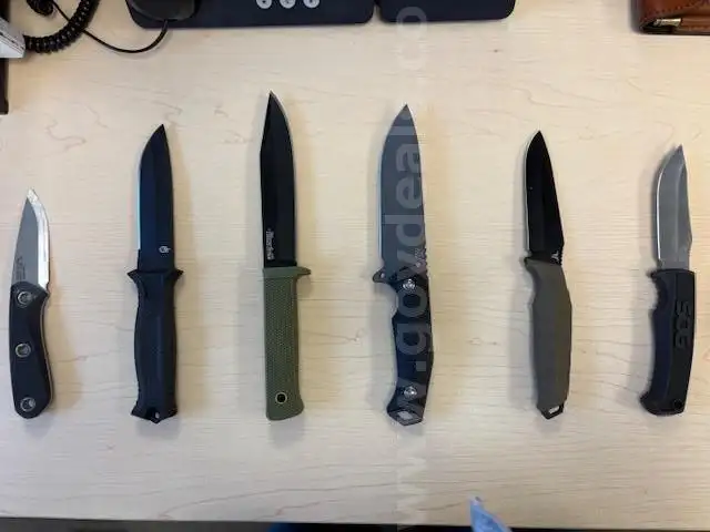 six fixed blade knives w/ case