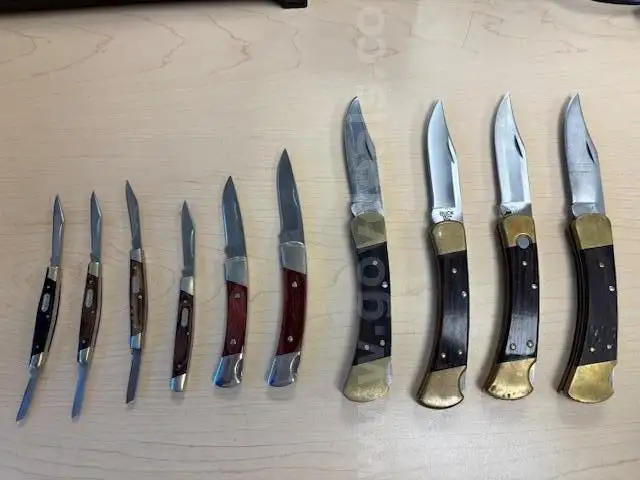 lot of ten wooden BUCK knives