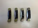 lot of ten wooden BUCK knives