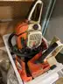 two chainsaws with misc. tools