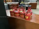 8 - Assorted Fuel Cans.