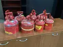 8 - Assorted Fuel Cans.