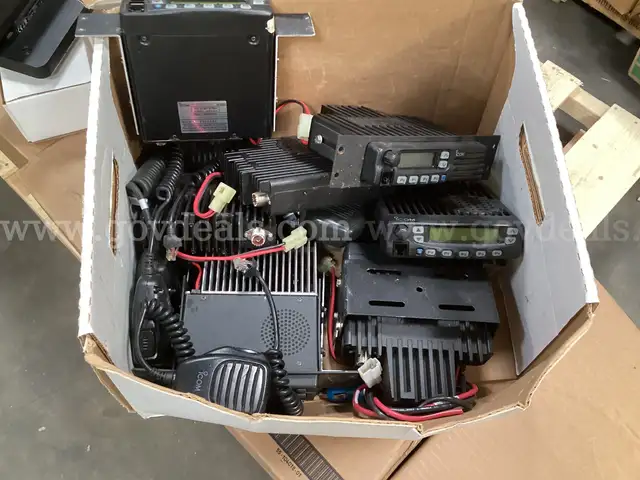 Box containing 8 -  Mounted 2 - Way Radios and 1 - Desk Top