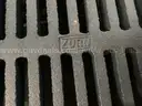 5 - Iron Drain Covers.