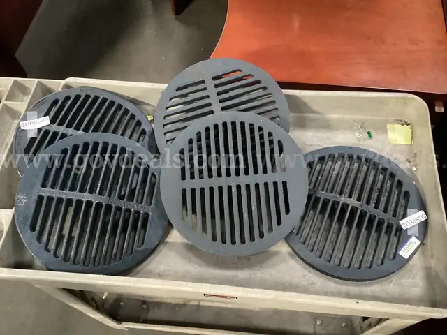5 - Iron Drain Covers.
